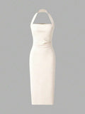 Back view cream halter midi dress