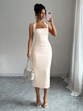 Cream halter bodycon midi dress front view