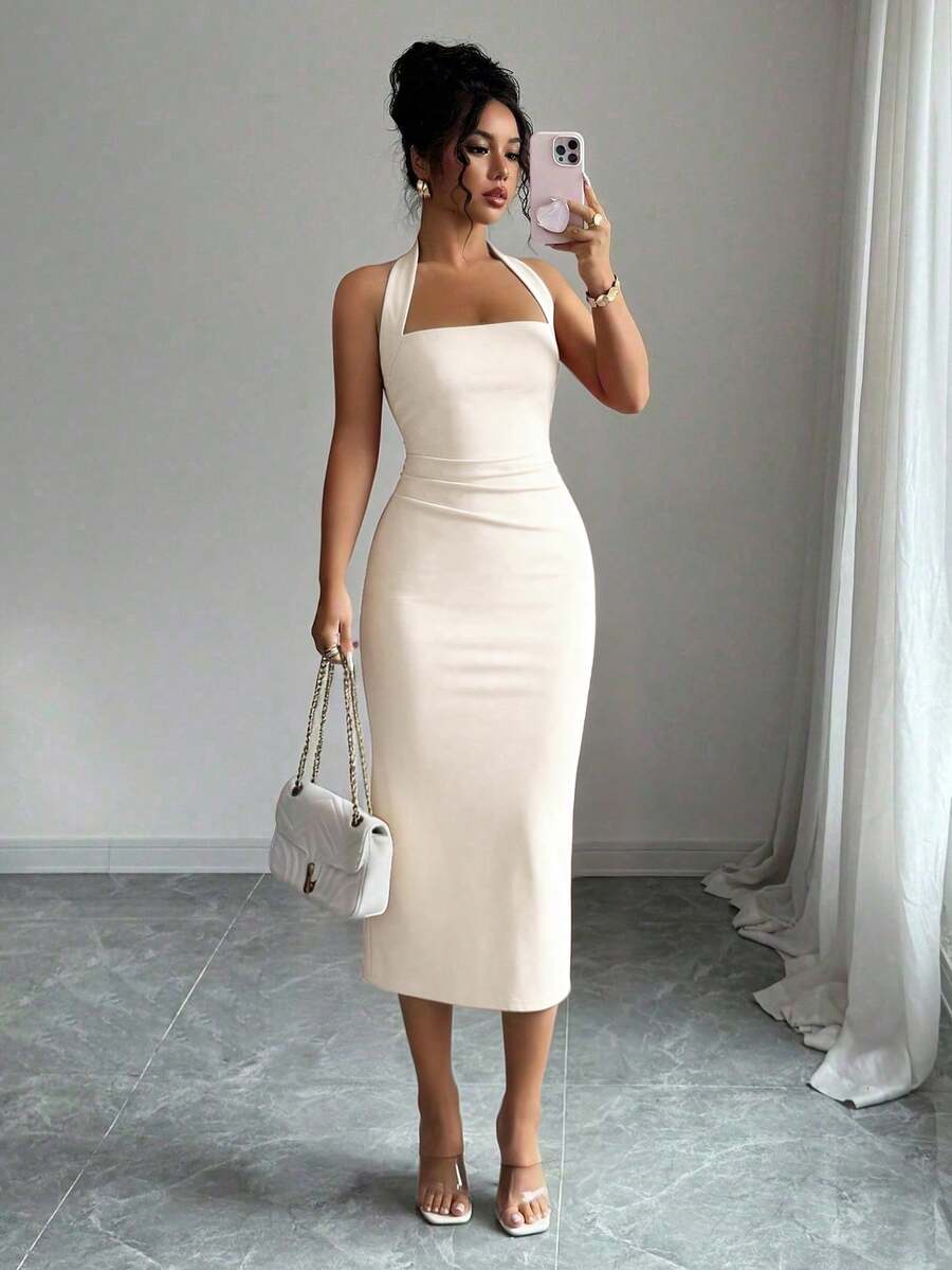 Cream halter bodycon midi dress front view