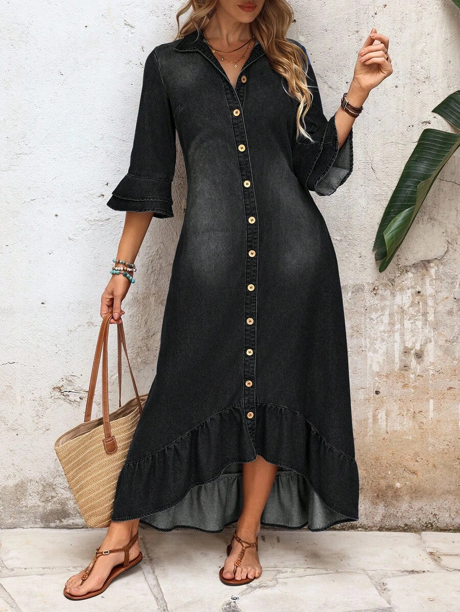 Front view of black wash denim shirt dress with collar and ruffle hem