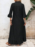 Back view of black denim dress with relaxed fit and flounce sleeves