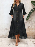 Front view of washed black denim button dress with pockets and bell sleeves