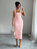 Blush pink halter bodycon midi dress front view