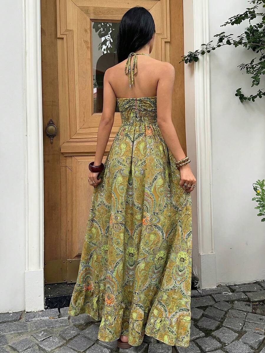 Olive green paisley halter maxi dress with front ring detail and flowing skirt