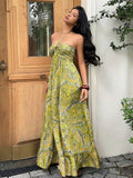 Olive green paisley halter maxi dress with front ring detail and flowing skirt
