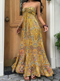 Mustard yellow paisley halter maxi dress with ruched tie bust and ruffle hem