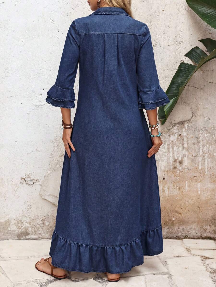 Back view of dark wash denim dress with collar and long relaxed shape