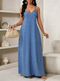 Light blue V-neck cami maxi dress with roomy A-line silhouette and straw clutch