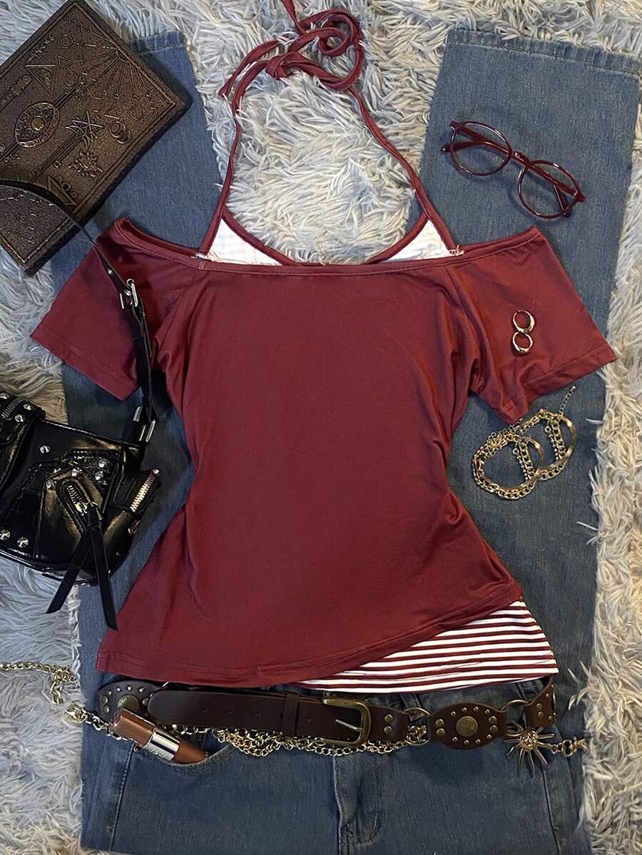 Back flat lay of burgundy off-shoulder top with striped halter ties and layered hem