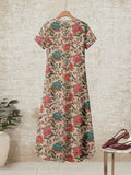 Hanger back view of beige botanical loose maxi dress with short sleeves