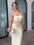 Side front view of pale yellow bodycon skirt set with soft flared hem
