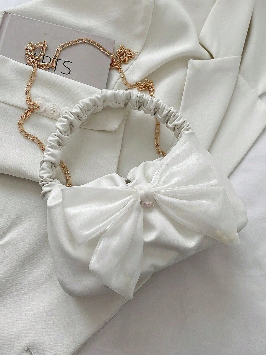 Image 6 - closure detail of Fashionable Crescent-Shaped Handbag with Silk Scarf Bow - Perfect Valentine’s Day Gift for Women