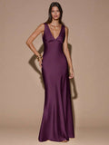 Front view of blue sleeveless deep V-neck maxi dress with crossed open back, shown for wedding and evening wear