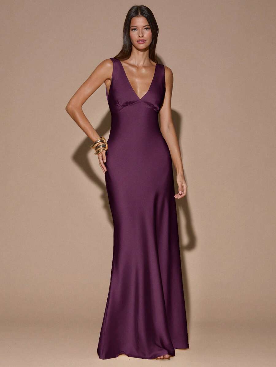 Front view of blue sleeveless deep V-neck maxi dress with crossed open back, shown for wedding and evening wear