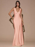 Back view of sage green sleeveless deep V-neck maxi dress with crossed open back, shown for wedding and evening wear