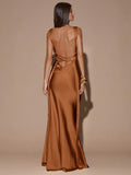 Front view of teal blue sleeveless deep V-neck maxi dress with crossed open back, shown for wedding and evening wear