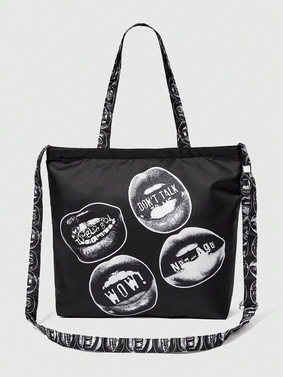 Black graphic tote crossbody bag with large lip artwork and soft body