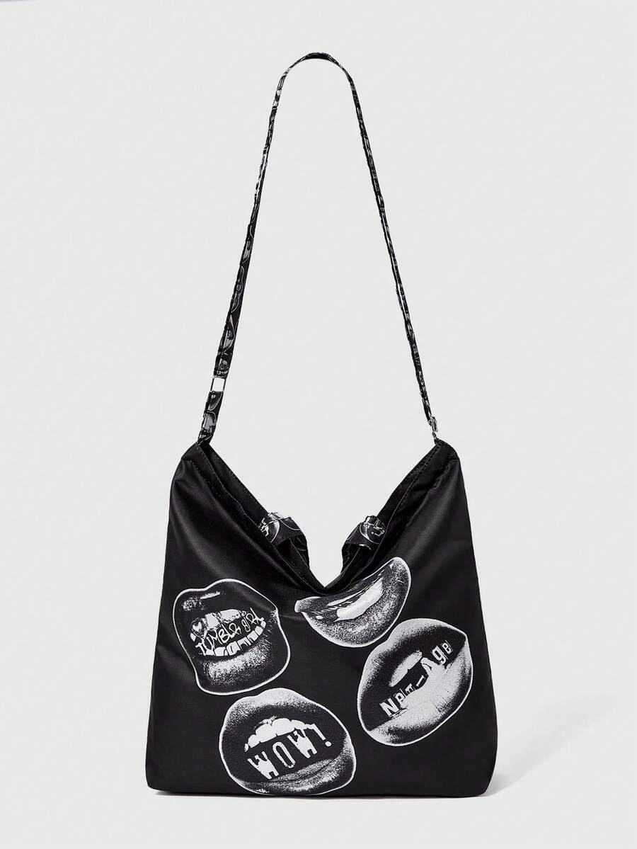 Lifestyle view of black graphic crossbody tote bag