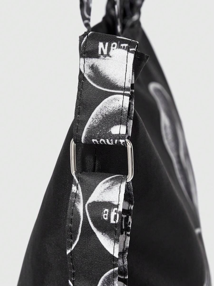 Detail view of black lip print bag with adjustable strap and metal buckle