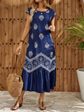Navy boho print maxi dress back view with center seam