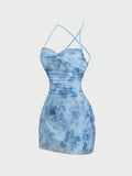 Back view of criss-cross strap dress for stage and party styling