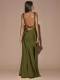 Front view of black sleeveless deep V-neck maxi dress with crossed open back, shown for wedding and evening wear