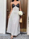 Capture effortless elegance with this blue plaid halter maxi dress, designed to blend classic charm with modern sophistication.