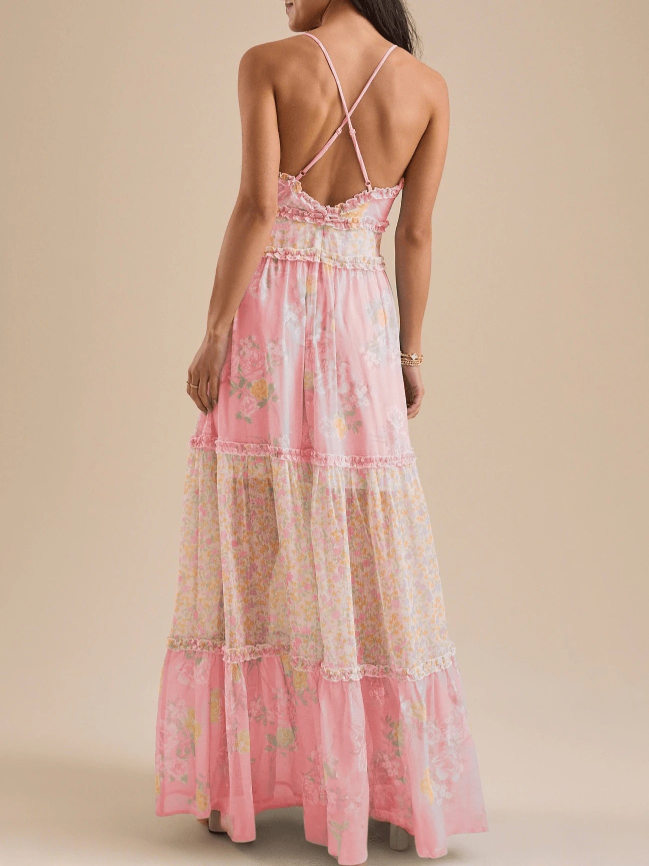 Pale blue floral maxi dress with open back and crossed straps