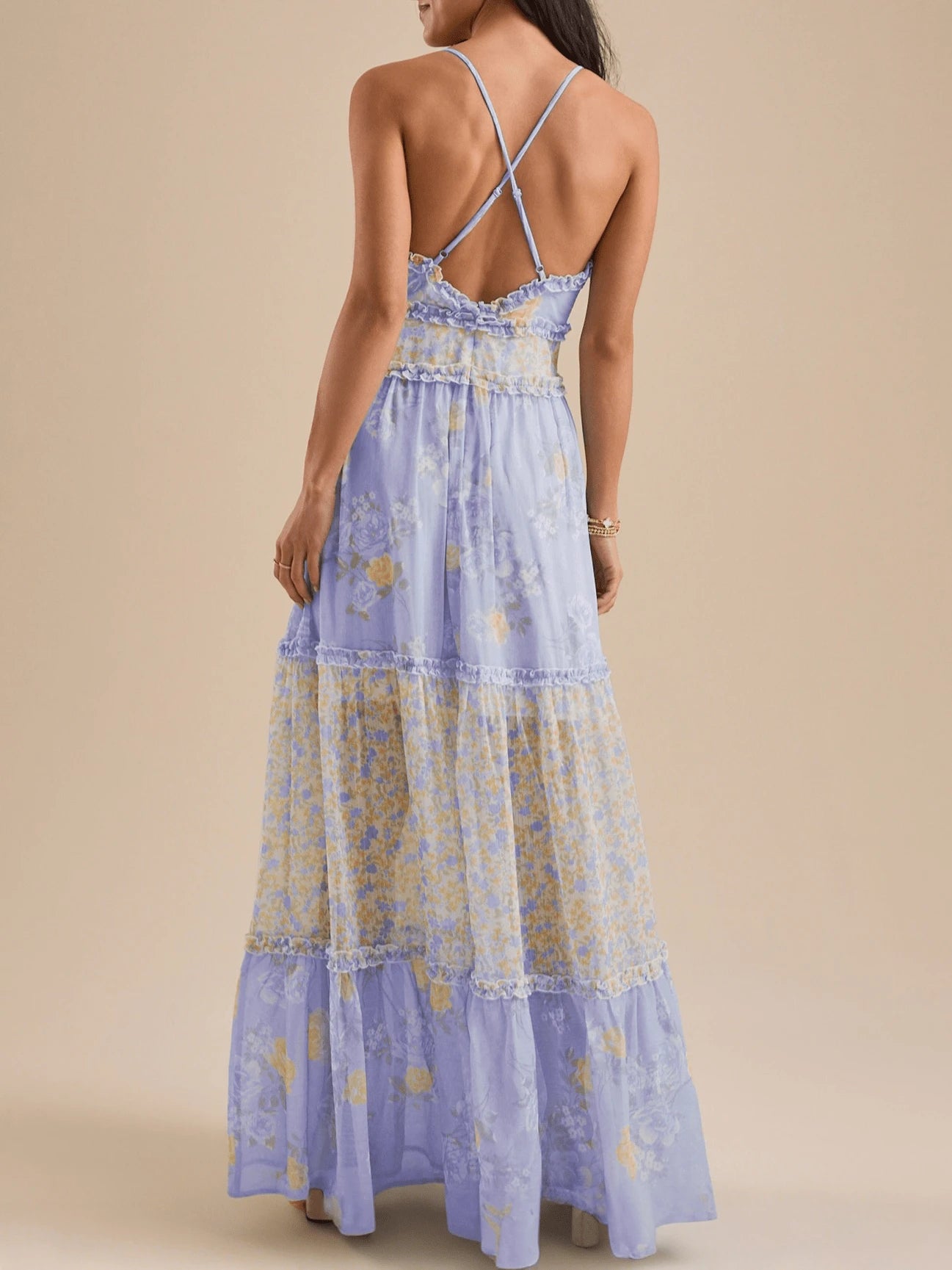Lavender floral dress with ruffled neckline and tiered hem