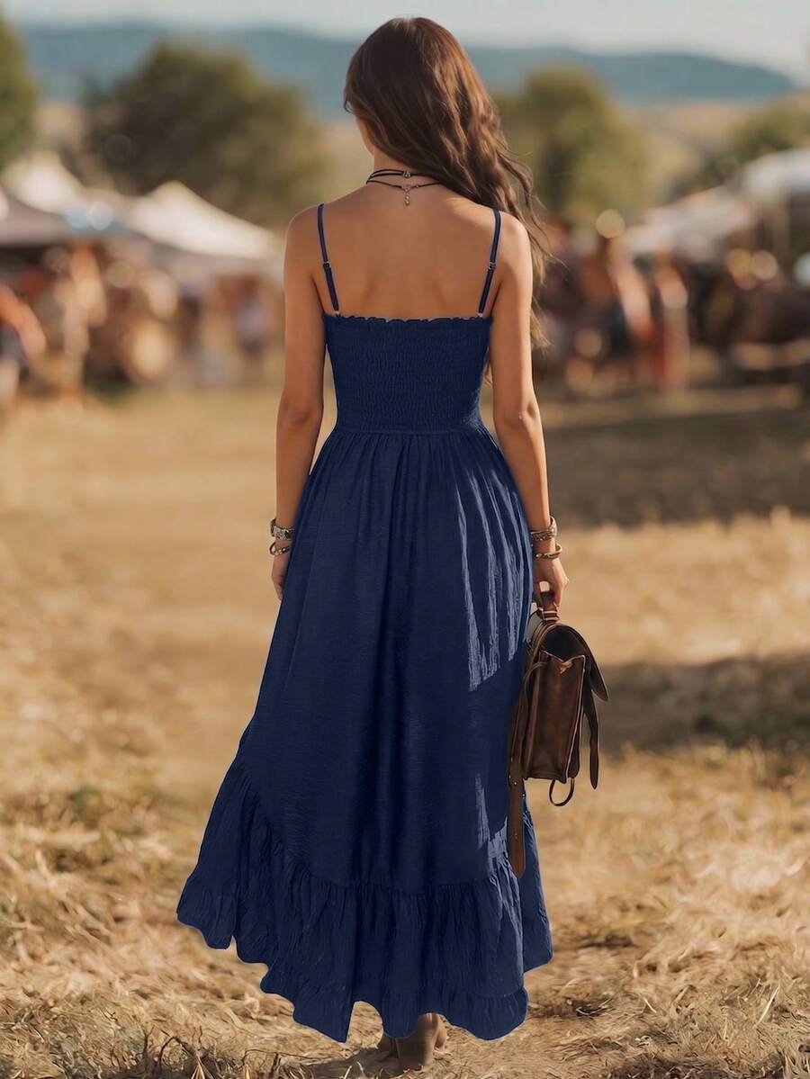 Navy spaghetti strap high low dress with button front and flowing skirt