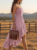 Pink high low vacation dress side view with button front and ruffle panel