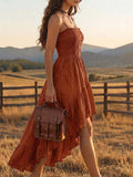 Rust orange button front dress side view with diagonal ruffle skirt