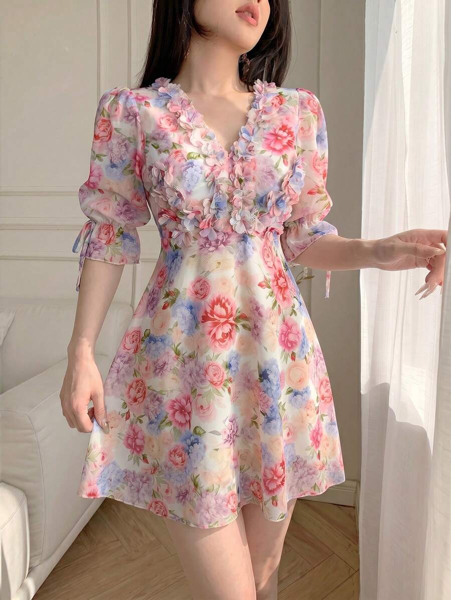 Front view of pastel floral V neck puff sleeve mini dress showing visible color, print, and silhouette