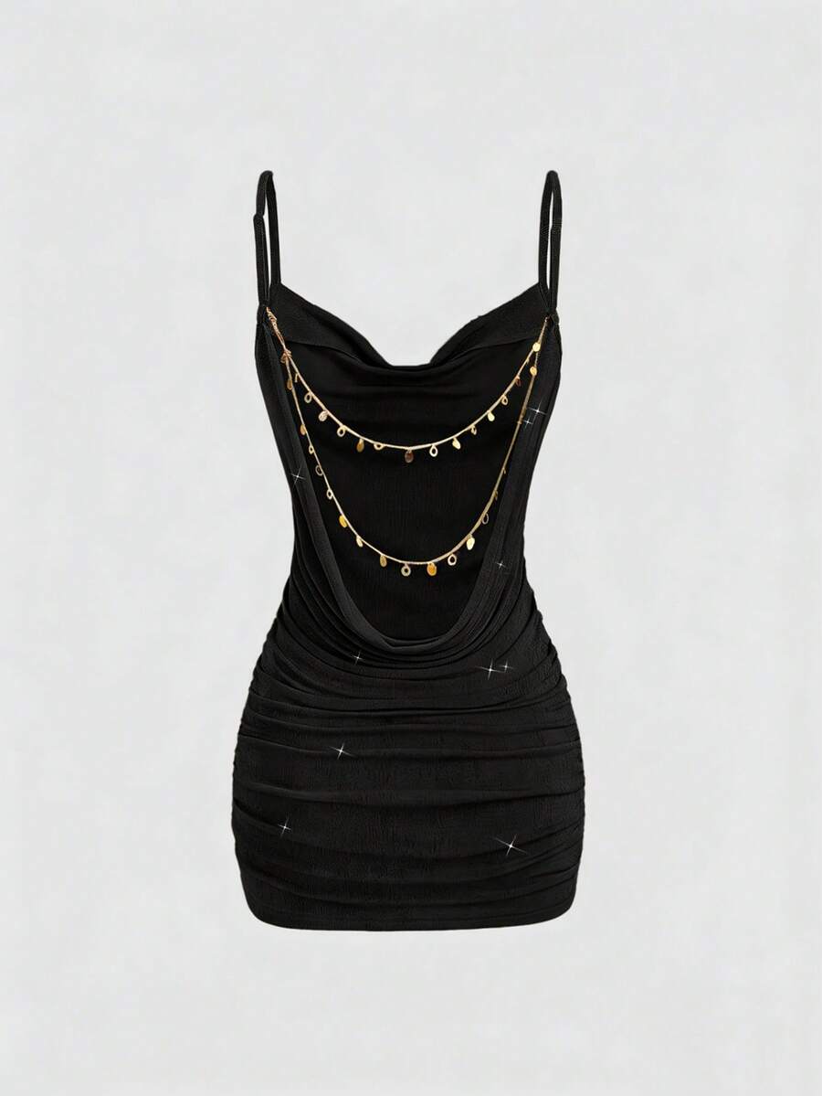 Apricot ruched cami mini dress with spaghetti straps and fitted silhouette