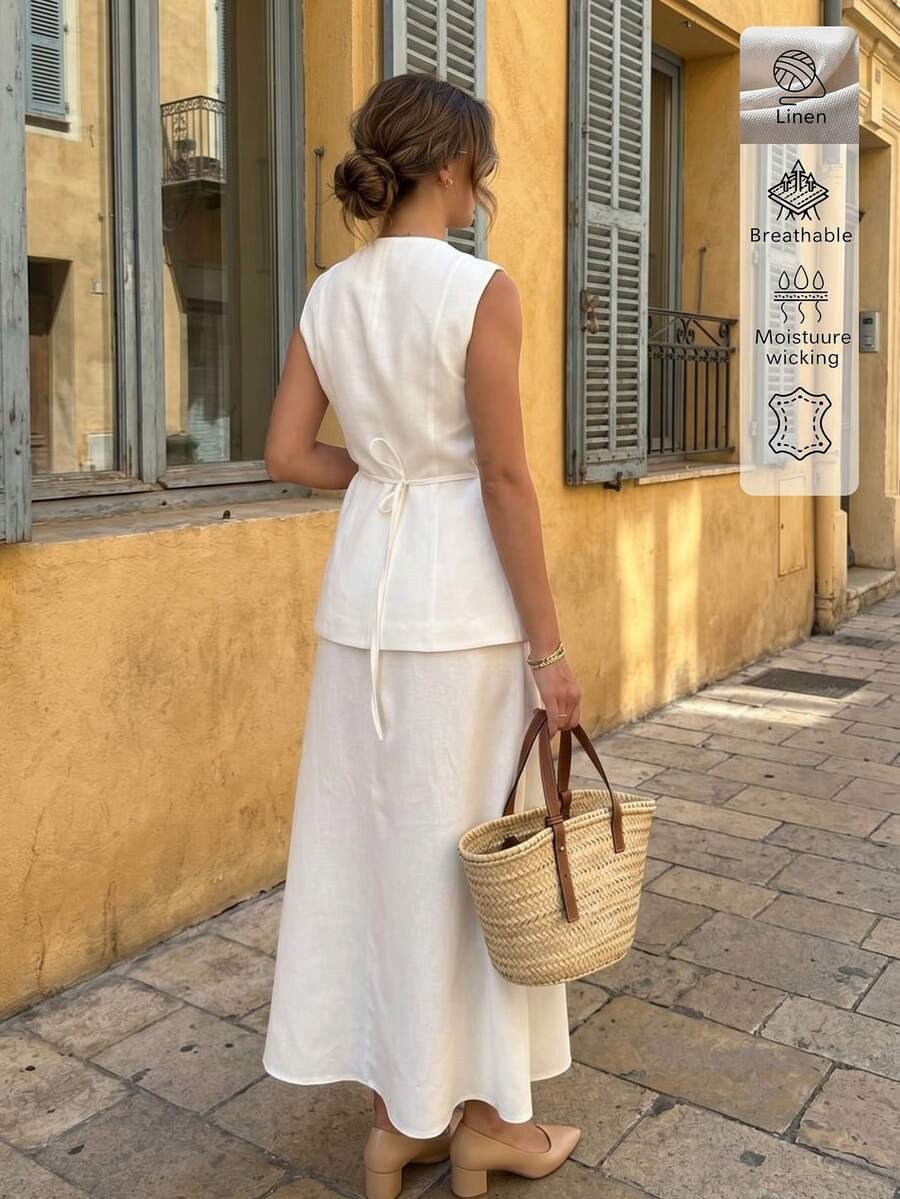 Back View of ivory white sleeveless vest and maxi skirt set for office and daily wear