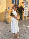 Full-Length Front View of ivory white sleeveless vest and maxi skirt set for office and daily wear