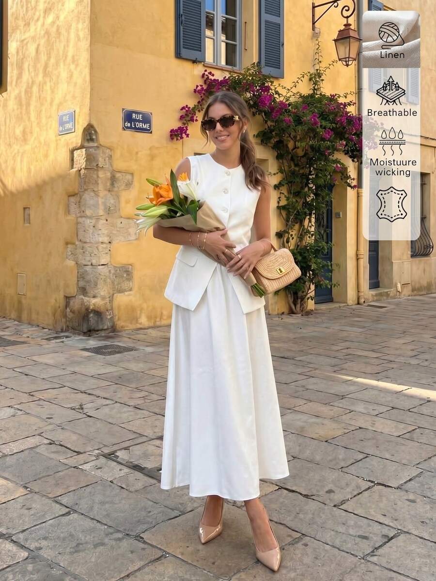 Full-Length Front View of ivory white sleeveless vest and maxi skirt set for office and daily wear