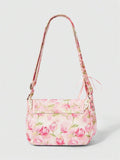 Rusty rose soft baguette bag showing rounded bottom and metal hardware