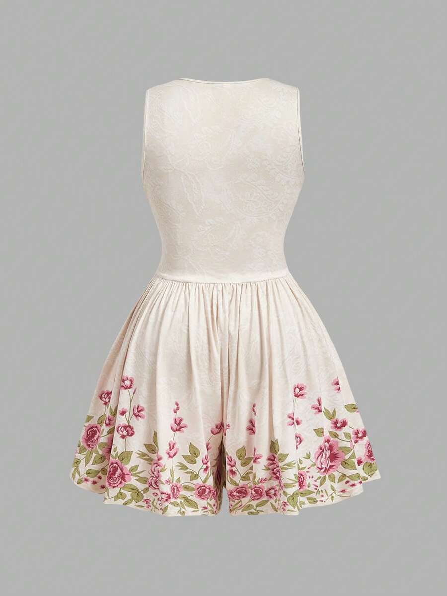 Outdoor front view of ivory plus size floral V-neck romper with ruched waist