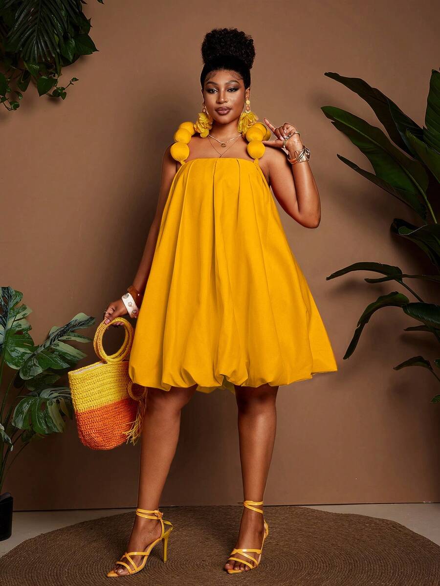 Image 11 - fit detail of Chic Plus Size Floral Puff Shoulder Peplum Dress for Effortless Elegance