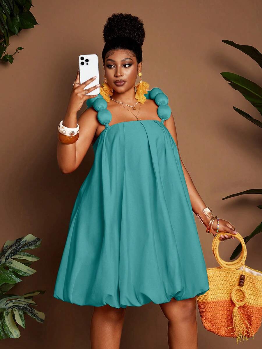 Image 1 - front view of Chic Plus Size Floral Puff Shoulder Peplum Dress for Effortless Elegance