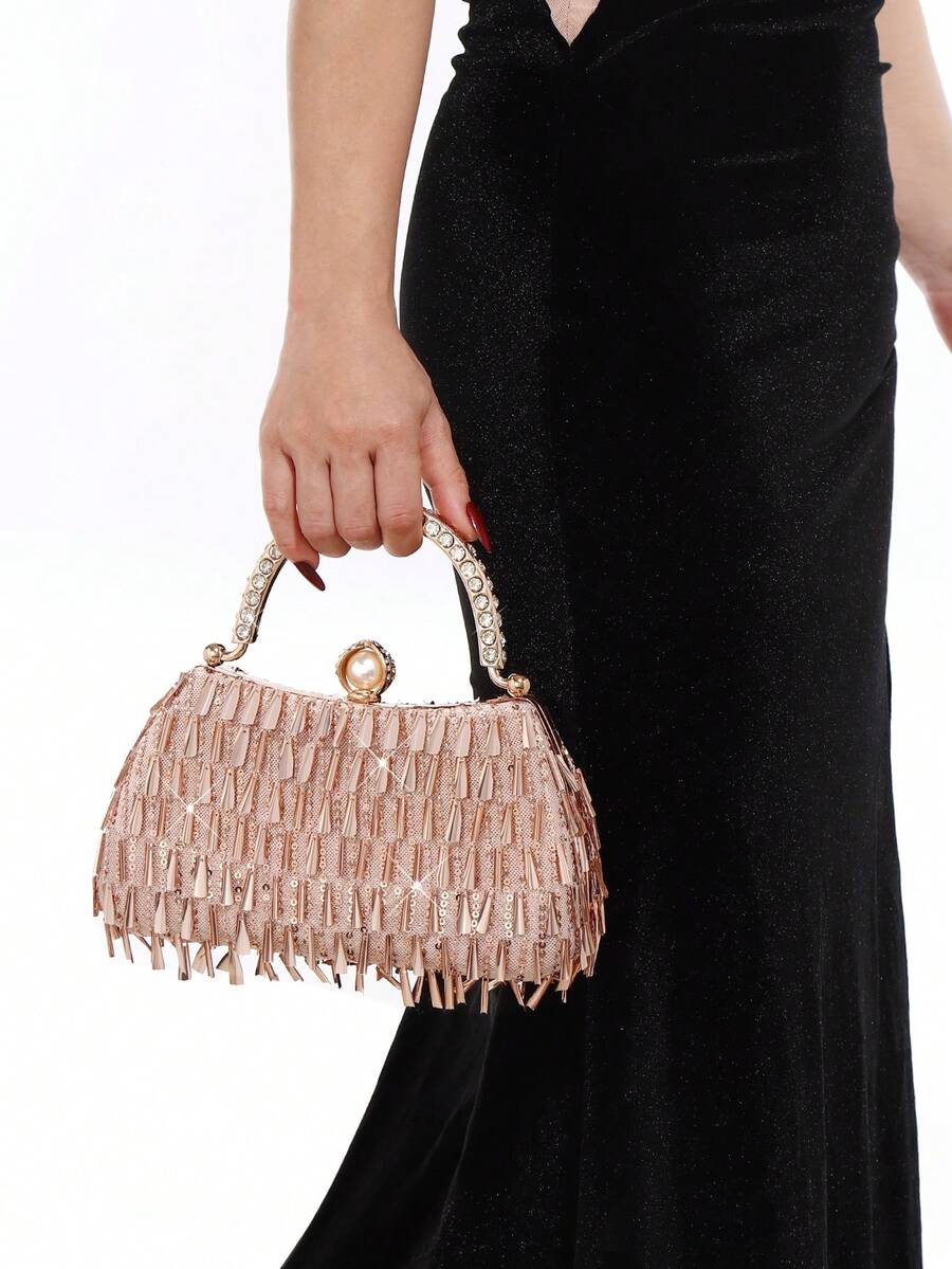 Elevate your evening look with this stunning rhinestone clutch bag, designed to turn heads at any formal occasion. Adorned with sparkling rhinestones that catch the light beautifully, this clutch combines glamour with practicality. The elegant tassel detail adds a sophisticated finishing touch, while the compact size fits essentials perfectly for parties, weddings, proms, and special events. Crafted for those who refuse to compromise on style
