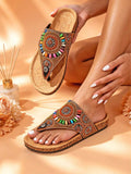 Top view of beaded V strap thong sandals with multicolor stones and metallic accents