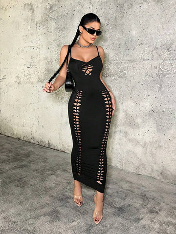 Front full-body view black spaghetti strap bodycon maxi dress with chest and side lattice cutouts