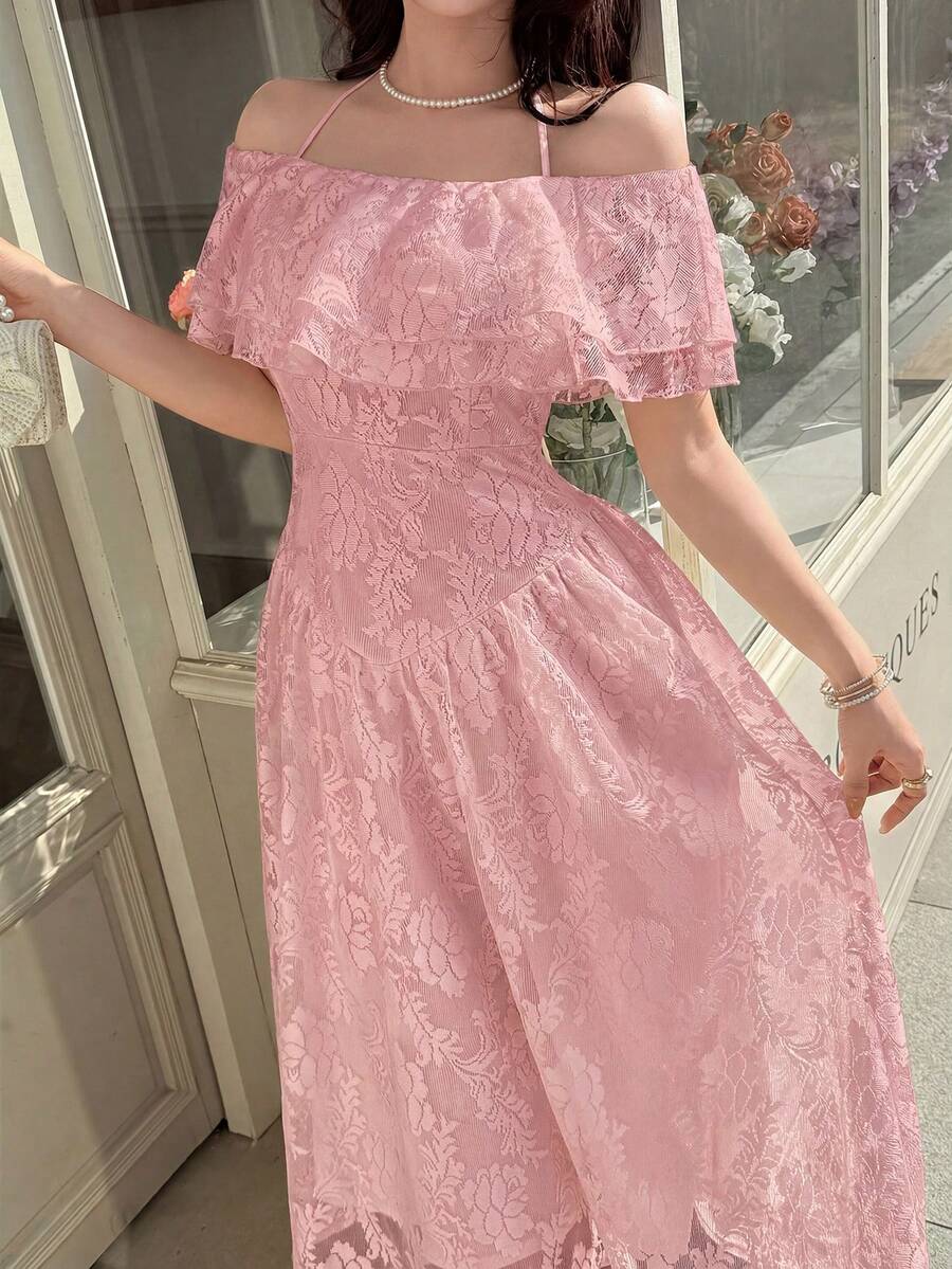 Close view of dusty pink floral ruffled neckline and fitted midi dress