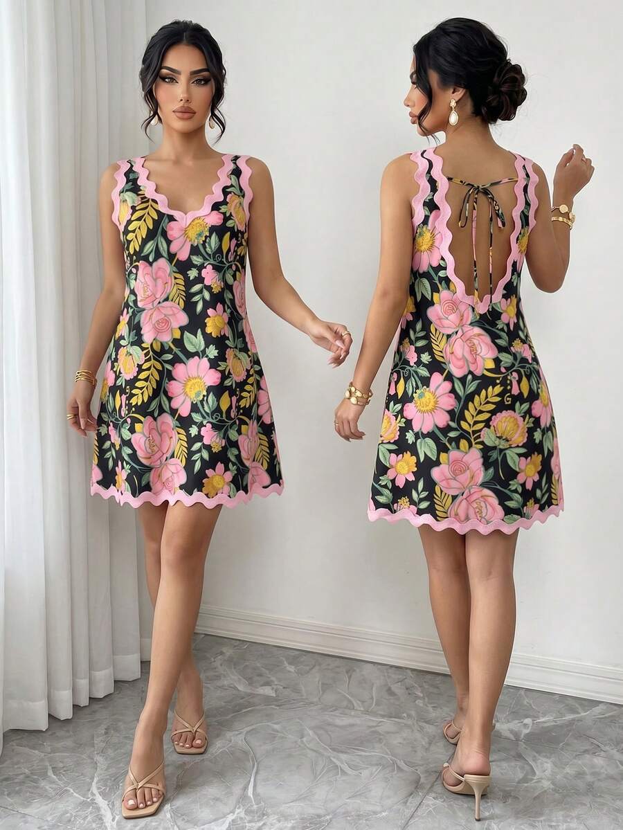 Front view of floral backless mini dress for summer vacations