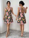 Front view of floral backless mini dress for summer vacations