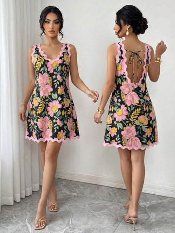 Front view of floral backless mini dress for summer vacations