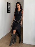 Angled view of black floral lace high-low dress showing fitted bodice and uneven hem
