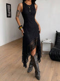 Close view of black lace dress neckline, sleeveless cut, fitted torso and sheer asymmetrical hem